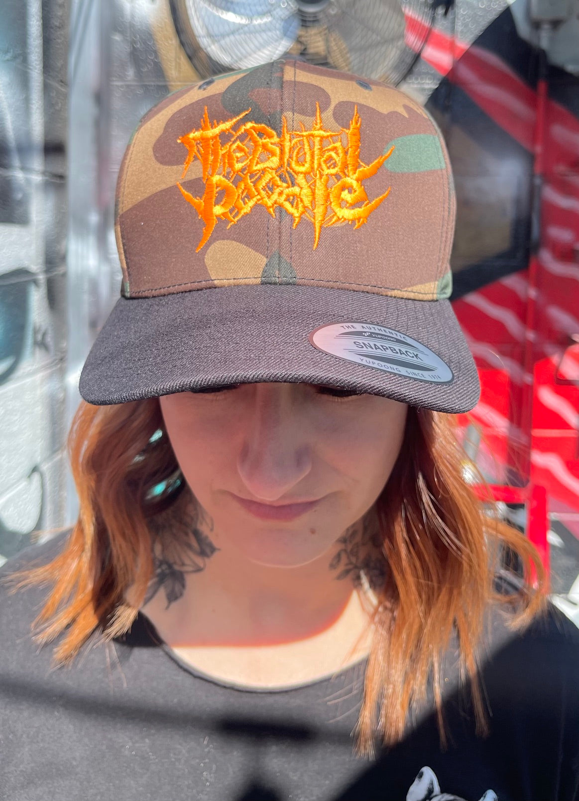 Black bill Camo & Orange Snapback